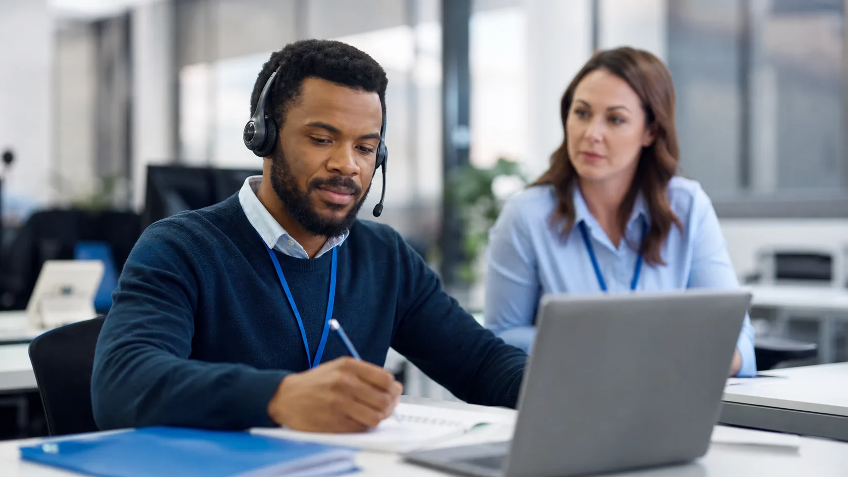 Contact centre adviser managing a high-pressure telephone call